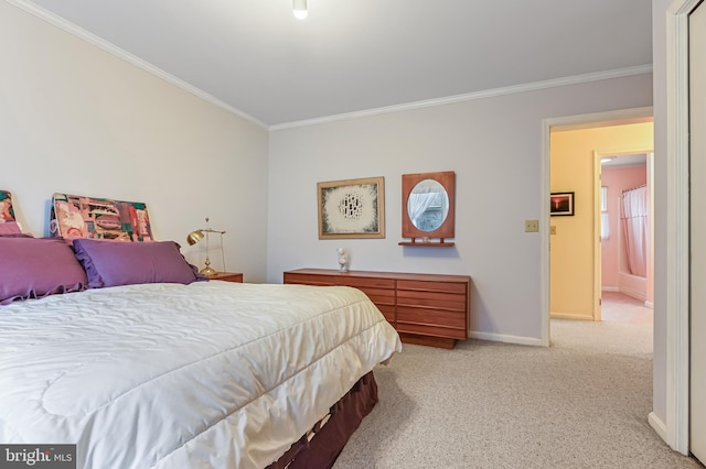 bedroom with ornamental molding, light colored carpet, and baseboards