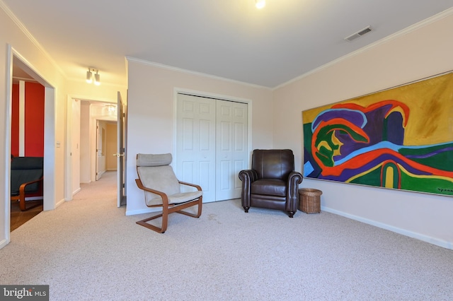 living area featuring carpet floors, baseboards, visible vents, and ornamental molding