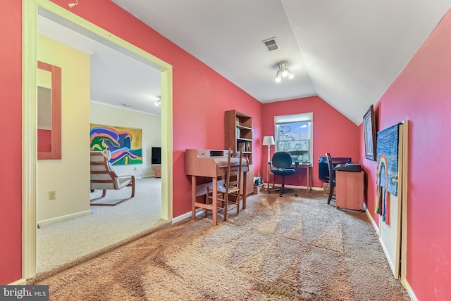 office area with lofted ceiling, carpet, visible vents, and baseboards