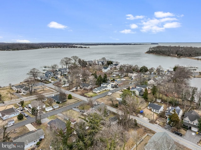 bird's eye view with a water view and a residential view