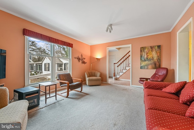 living room featuring stairs, carpet floors, ornamental molding, and baseboards