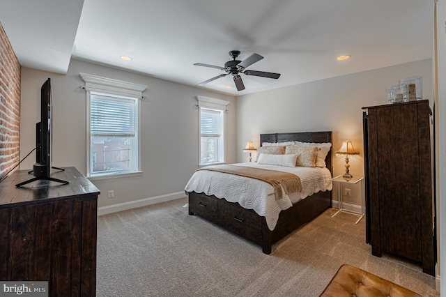 bedroom featuring baseboards, recessed lighting, a ceiling fan, and light colored carpet