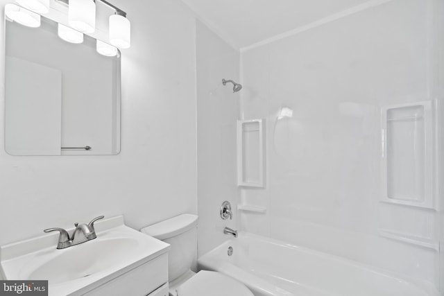 full bath featuring toilet, vanity, and shower / tub combination