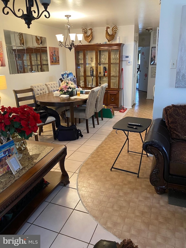 dining area with a notable chandelier