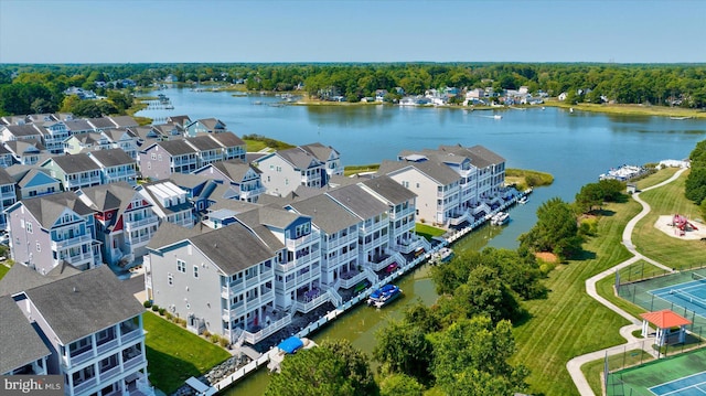 drone / aerial view featuring a water view and a residential view