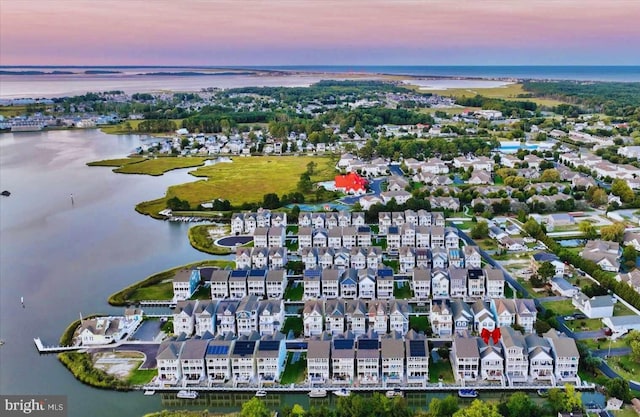 aerial view with a water view and a residential view