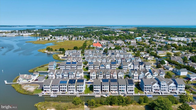 birds eye view of property with a residential view and a water view