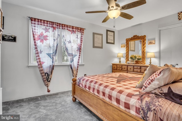 carpeted bedroom featuring a ceiling fan