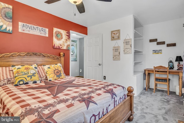 carpeted bedroom featuring a ceiling fan