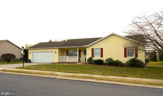 ranch-style home with driveway, an attached garage, a porch, and a front lawn