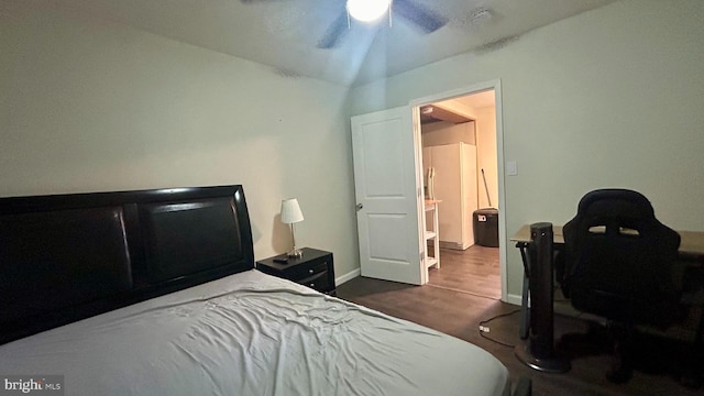 bedroom with baseboards and a ceiling fan