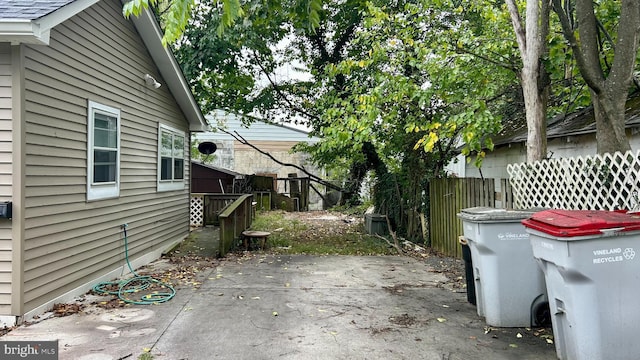 view of patio / terrace featuring fence