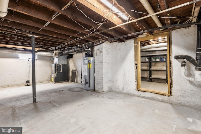 unfinished basement featuring heating unit and water heater