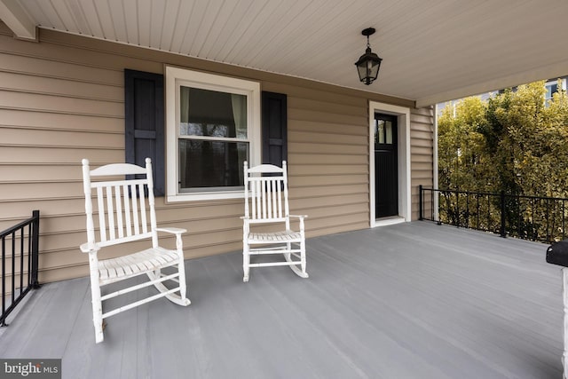 deck featuring covered porch