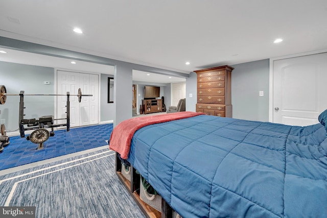 carpeted bedroom featuring recessed lighting