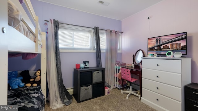 carpeted bedroom featuring visible vents