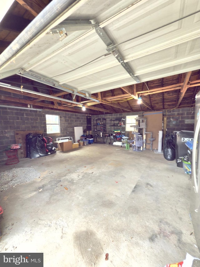 garage featuring concrete block wall