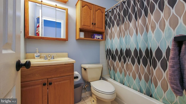 full bath with shower / bathtub combination with curtain, tile patterned flooring, vanity, and toilet