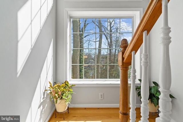 interior details with wood finished floors and baseboards