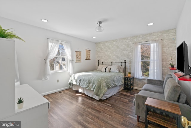 bedroom with dark wood-style floors, recessed lighting, and baseboards