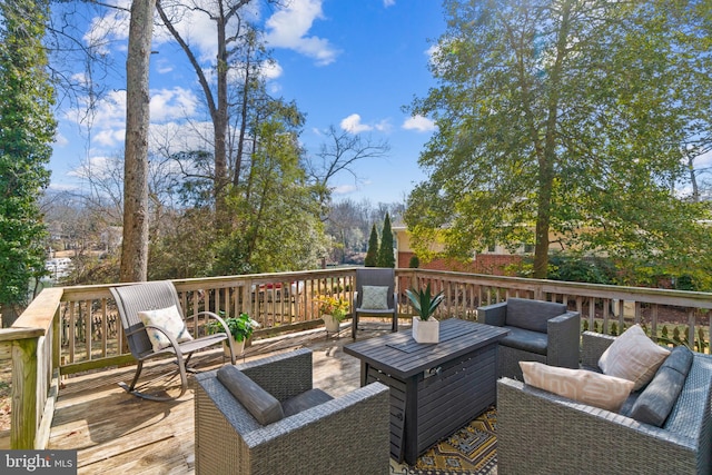 deck with an outdoor hangout area