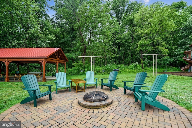 view of patio / terrace with a gazebo and an outdoor fire pit