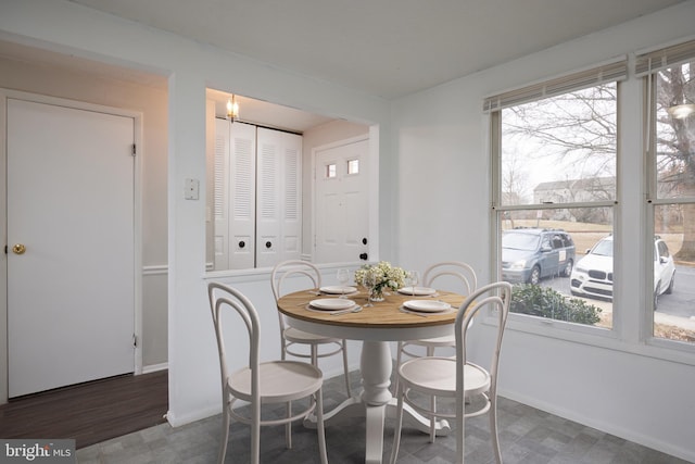 dining space with baseboards