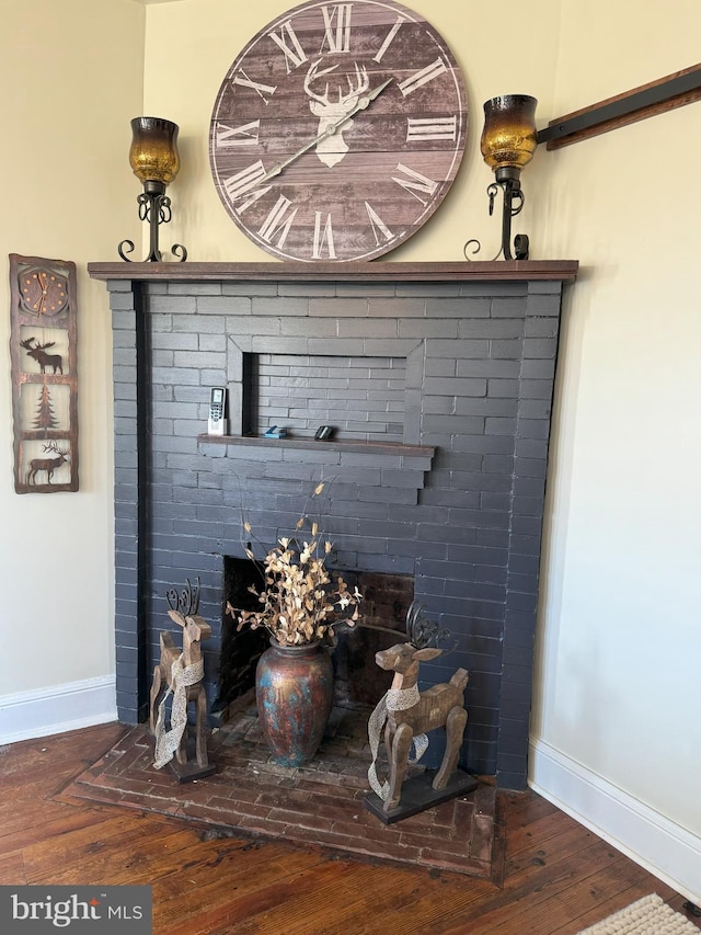 374 Finley Rd, Raphine, VA 24472 - details featuring baseboards, wood finished floors, and a fireplace