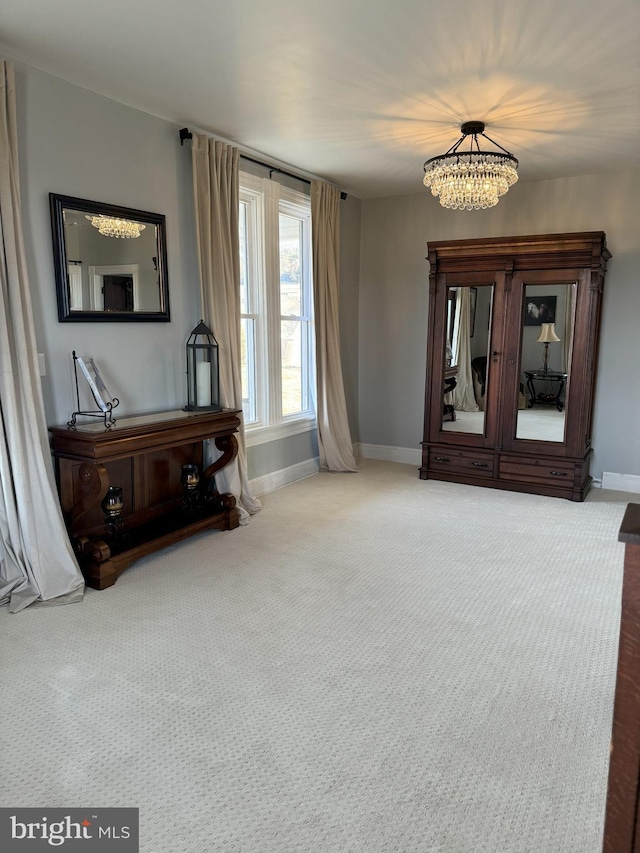 374 Finley Rd, Raphine, VA 24472 - interior space with baseboards, an inviting chandelier, and carpet