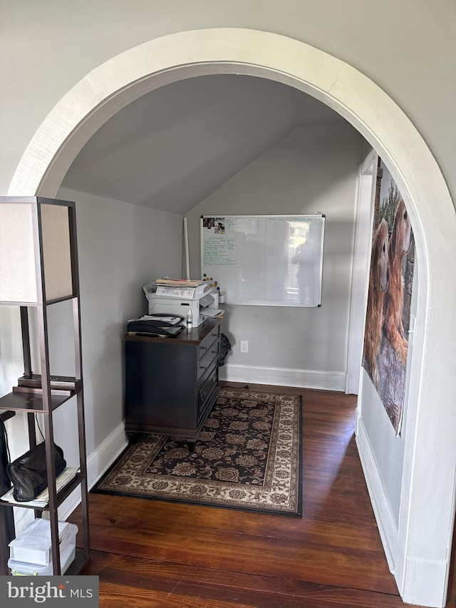 374 Finley Rd, Raphine, VA 24472 - interior space with baseboards, vaulted ceiling, wood finished floors, and arched walkways