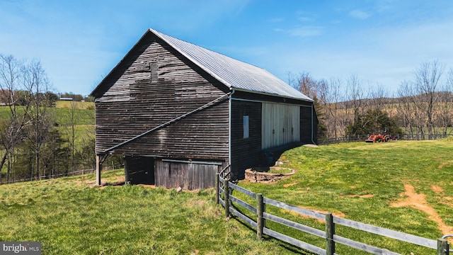 374 Finley Rd, Raphine, VA 24472 - view of side of home featuring fence, an outbuilding, a yard, and metal roof