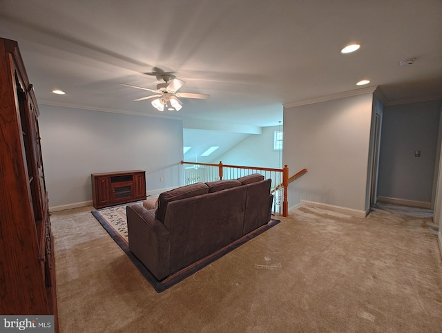 living area with light carpet, baseboards, crown molding, and recessed lighting