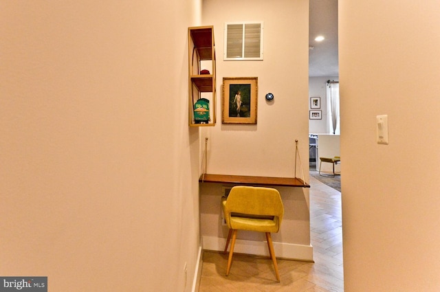 interior space featuring visible vents and baseboards