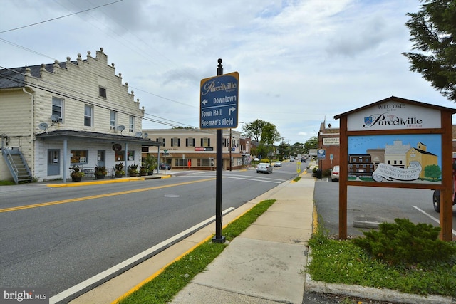 view of street with curbs and sidewalks