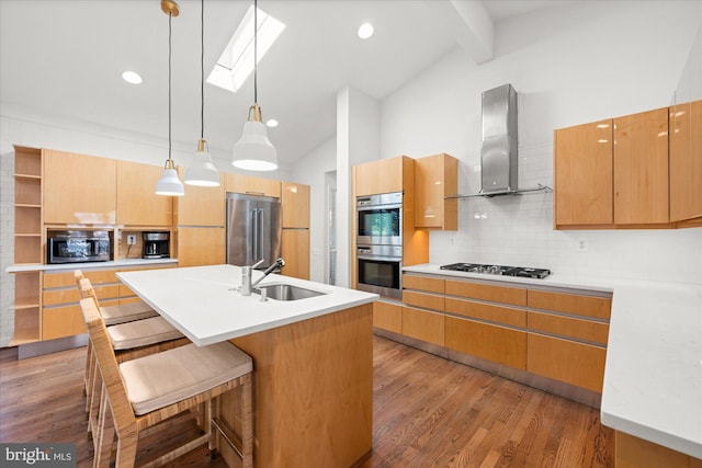 kitchen with wall chimney exhaust hood, stainless steel appliances, light wood-type flooring, open shelves, and a sink