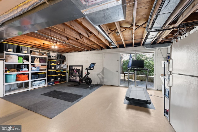 exercise area with concrete block wall