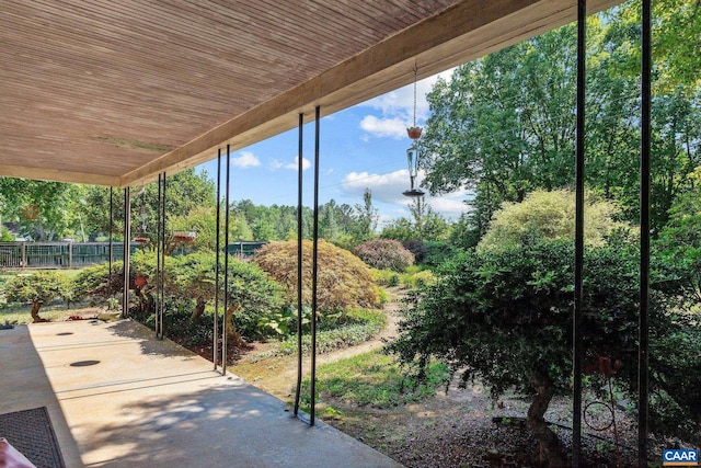 view of patio featuring fence