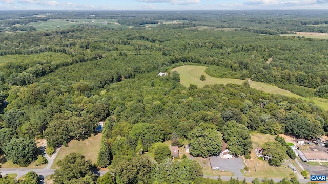 aerial view featuring a view of trees