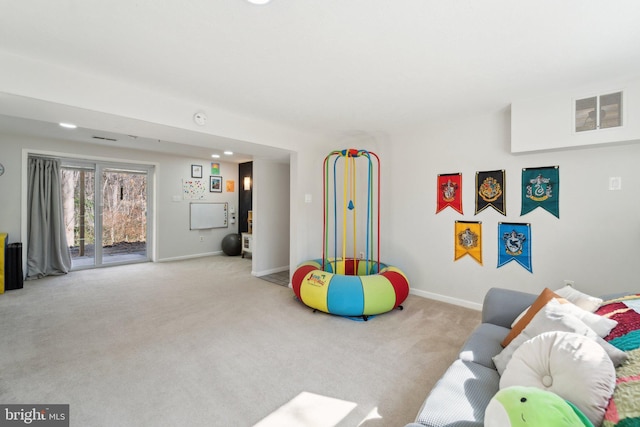 playroom featuring visible vents, baseboards, and carpet flooring