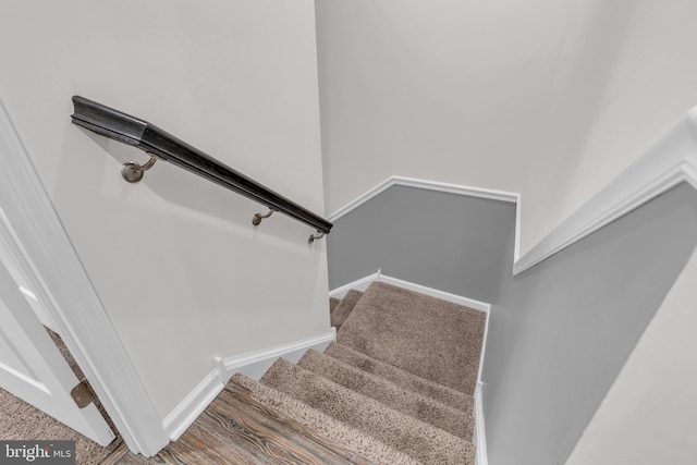 stairway with baseboards