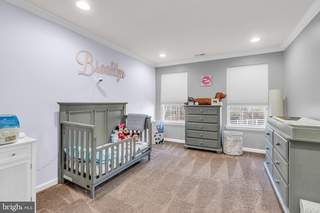 bedroom with carpet, ornamental molding, and baseboards