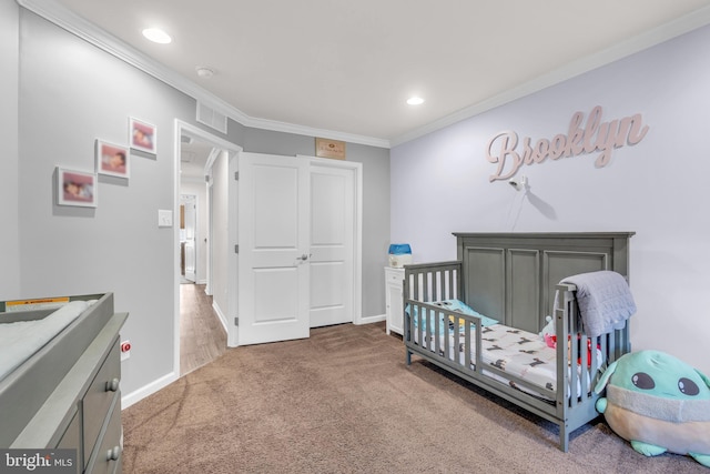 bedroom with recessed lighting, visible vents, baseboards, ornamental molding, and carpet