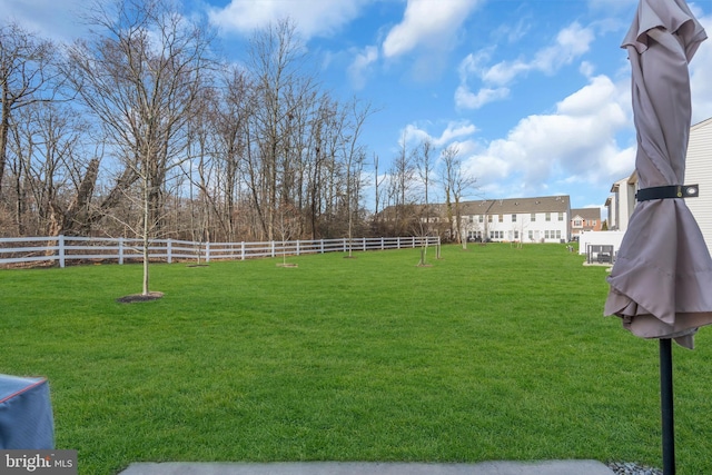 view of yard with fence