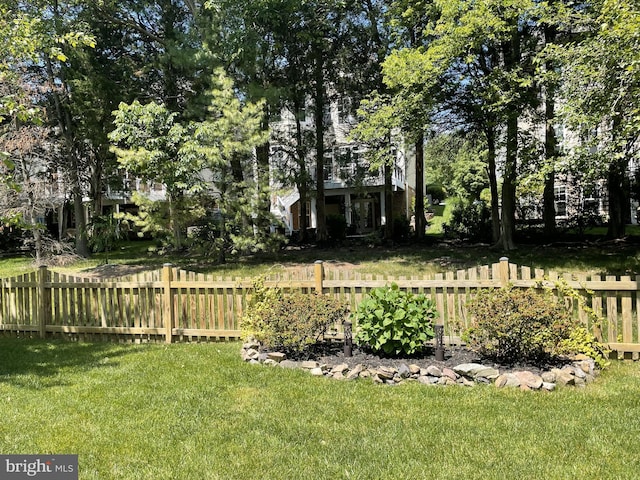 view of yard with fence