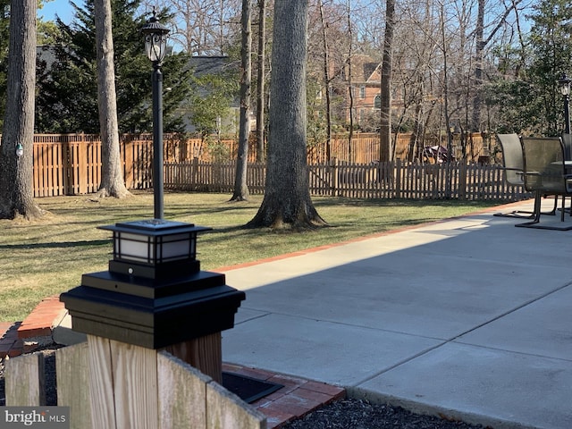 view of patio / terrace featuring fence