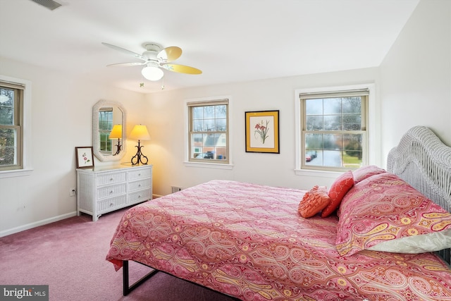 bedroom with baseboards, ceiling fan, and carpet flooring