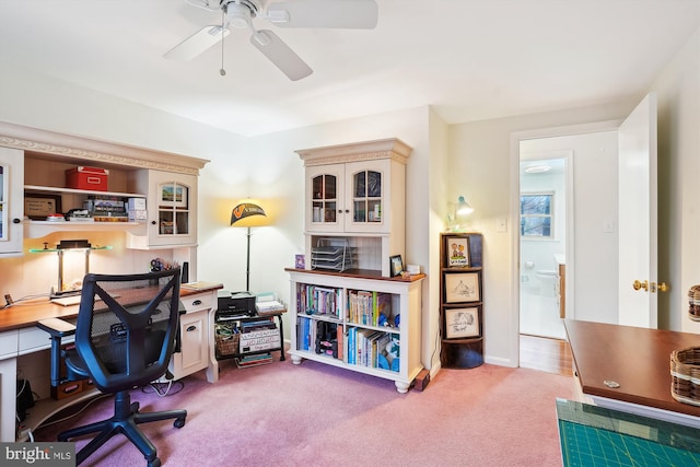 office space featuring carpet and ceiling fan