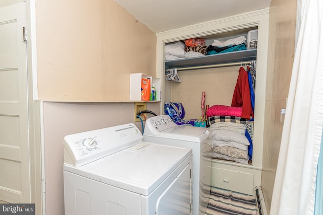 615 Walnut St, Pocomoke City, MD 21851 - laundry room featuring a baseboard radiator, independent washer and dryer, and laundry area