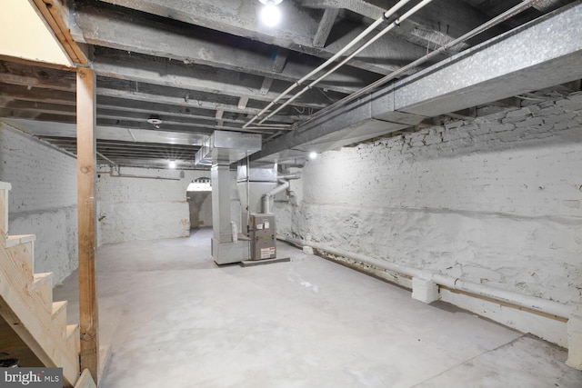 unfinished basement with heating unit