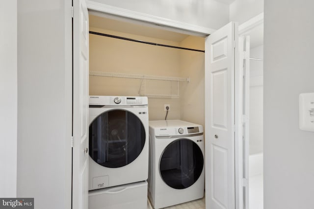 laundry area featuring laundry area and washer and clothes dryer